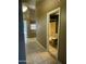 Hallway leading to a bathroom with tub/shower combo at 11808 N 111Th Way, Scottsdale, AZ 85259