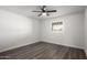 Bedroom with ceiling fan and wood-look flooring at 1430 W Maddock Rd, Phoenix, AZ 85086