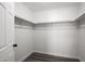 Spacious closet with built-in shelving at 1430 W Maddock Rd, Phoenix, AZ 85086