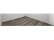 Empty room with wood-look flooring at 1430 W Maddock Rd, Phoenix, AZ 85086