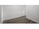 Hallway with wood-look flooring at 1430 W Maddock Rd, Phoenix, AZ 85086