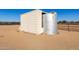Exterior view of a storage shed and a water tank at 1430 W Maddock Rd, Phoenix, AZ 85086