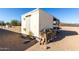 Storage shed with some items stored on shelves and the ground at 1430 W Maddock Rd, Phoenix, AZ 85086