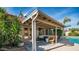 Spacious covered patio overlooking the pool, perfect for outdoor entertaining at 19453 N 35Th Pl, Phoenix, AZ 85050