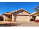 Charming single-story home with a two-car garage and desert landscaping at 2042 N 109Th Ave, Avondale, AZ 85392