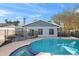 Inviting kidney-shaped pool with a spa and a large deck at 2264 E Holmes Ave, Mesa, AZ 85204