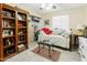 Cozy bedroom with a daybed, built-in shelving and a ceiling fan at 3109 E Lupine Ave, Phoenix, AZ 85028