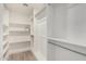 Spacious walk-in closet with ample shelving and hanging space at 3721 N 150Th Ct, Goodyear, AZ 85395