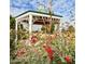 Gazebo surrounded by flowers and greenery at 3763 S Loback Ln, Gilbert, AZ 85297