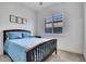 Cozy bedroom with plantation shutters and plush carpet at 4711 N 212Th Dr, Buckeye, AZ 85396