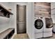 Well-organized laundry room with built-in storage and LG appliances at 4711 N 212Th Dr, Buckeye, AZ 85396