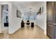 Home office with a desk, chair, window, and shiplap accent wall at 4711 N 212Th Dr, Buckeye, AZ 85396