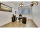 Dedicated office space with a desk, chair, and natural light at 4711 N 212Th Dr, Buckeye, AZ 85396