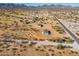 An aerial view of a newly constructed home in a rural neighborhood at 51937 W Wildwood Rd, Maricopa, AZ 85139