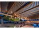 Outdoor Pergola with string lights and dining area at 5907 W Running Deer Trl, Phoenix, AZ 85083