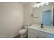 Clean, modern half-bath with white vanity and updated fixtures at 6638 W Hughes Dr, Phoenix, AZ 85043