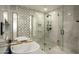Spa-like bathroom with walk-in shower and soaking tub at 9919 N 47Th Pl, Phoenix, AZ 85028