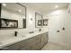 Modern bathroom with double vanity and elegant fixtures at 9919 N 47Th Pl, Phoenix, AZ 85028
