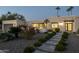 Modern home with attractive landscaping and a walkway leading to the entrance at 9919 N 47Th Pl, Phoenix, AZ 85028