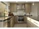 Sleek kitchen with contemporary cabinetry and a large island at 9919 N 47Th Pl, Phoenix, AZ 85028
