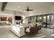 Spacious living area featuring a marble fireplace and access to the backyard at 9919 N 47Th Pl, Phoenix, AZ 85028
