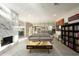 Open living space with marble fireplace and views to kitchen and dining at 9919 N 47Th Pl, Phoenix, AZ 85028