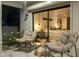 Relaxing patio with comfy seating overlooking bedroom at 9919 N 47Th Pl, Phoenix, AZ 85028