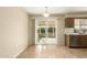 Dining area with sliding glass doors leading to patio at 10035 W Desert Rock Dr, Sun City, AZ 85351