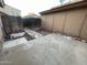 Backyard with a paved area and a wooden fence at 12445 N 21St Ave # 31, Phoenix, AZ 85029
