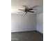 Living room with tile flooring and a ceiling fan at 12445 N 21St Ave # 31, Phoenix, AZ 85029