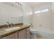 Bathroom with granite countertop, sink, toilet, and bathtub at 13635 N 103Rd Way, Scottsdale, AZ 85260