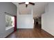 Open living space with hardwood floors and a view into another room at 14267 S 43Rd Pl, Phoenix, AZ 85044