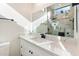 Modern bathroom with white vanity, quartz countertop, and large walk-in shower at 15921 E Primrose Dr, Fountain Hills, AZ 85268