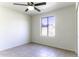 Bright bedroom with tiled flooring and large windows at 1748 E Shasta St, Casa Grande, AZ 85122