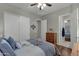 Bedroom with ensuite bathroom and wooden furniture at 1835 W Kingbird Dr, Chandler, AZ 85286