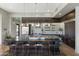 Modern community kitchen features stainless steel appliances and a large prep island at 2 E Biltmore Estates Dr # 115, Phoenix, AZ 85016