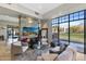 Relaxing community lounge with fireplace and comfortable seating near pool at 2 E Biltmore Estates Dr # 115, Phoenix, AZ 85016