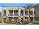 Three story building exterior with balconies at 2 E Biltmore Estates Dr # 115, Phoenix, AZ 85016