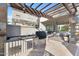 Outdoor kitchen with grill, sink, and ample prep space at 2 E Biltmore Estates Dr # 115, Phoenix, AZ 85016
