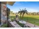 Patio with seating area and view of green space at 2 E Biltmore Estates Dr # 115, Phoenix, AZ 85016