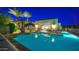 Relaxing lighted pool area at night at 2 E Biltmore Estates Dr # 115, Phoenix, AZ 85016