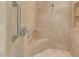 Walk-in shower with built-in seat and grab bars at 2 E Biltmore Estates Dr # 115, Phoenix, AZ 85016