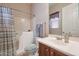 Bathroom with a walk-in tub, single vanity, and tiled floor at 3512 W Hidden Mountain Ct, Phoenix, AZ 85086