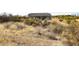 View of the home's backyard and surrounding desert landscape at 36023 N 140Th St, Scottsdale, AZ 85262