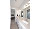 Modern bathroom with double vanity and white cabinets at 36023 N 140Th St, Scottsdale, AZ 85262