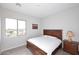 Spacious bedroom with large windows and wooden furniture at 36023 N 140Th St, Scottsdale, AZ 85262