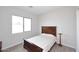 Cozy bedroom with wood bedframe and neutral walls at 36023 N 140Th St, Scottsdale, AZ 85262