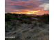Beautiful sunset over the desert landscape at 36023 N 140Th St, Scottsdale, AZ 85262