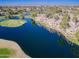 Aerial view of the complex with golf course and lake views at 3800 S Cantabria Cir # 1023, Chandler, AZ 85248