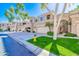 Two-story townhouses with garages and grassy front yards at 3800 S Cantabria Cir # 1023, Chandler, AZ 85248